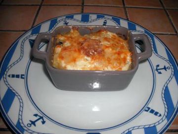 Gratin de pommes de terre au beaufort et à la saucisse de Morteau